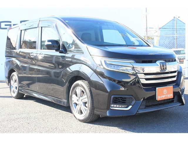 ステップワゴンスパーダ スパーダハイブリッド　Ｇ・ＥＸ　ホンダセンシング　禁煙車　純正後席モニター　純正９型ナビ　フルセグ　バックカメラ　アダクティブクルーズコントロール　衝突軽減ブレーキ　両側電動スライドドア　純正１６インチアルミホイール　誤発進抑制機能　ビルドインＥＴＣ（9枚目）