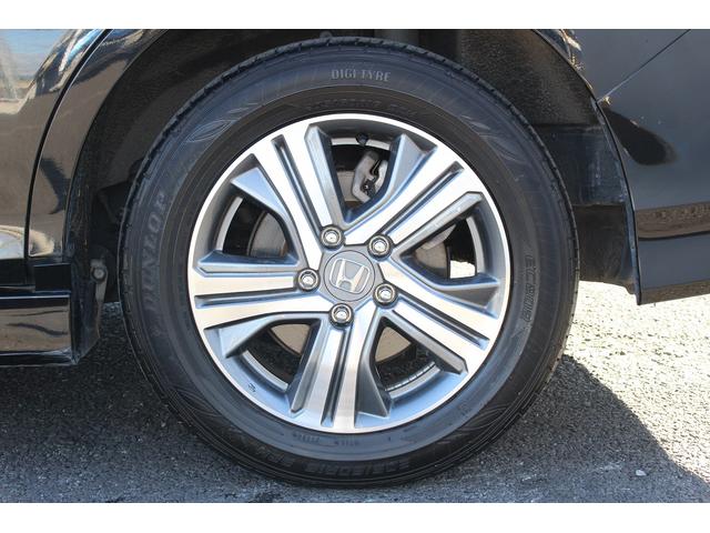 ステップワゴンスパーダ スパーダハイブリッド　Ｇ・ＥＸ　ホンダセンシング　禁煙車　純正後席モニター　純正９型ナビ　フルセグ　バックカメラ　アダクティブクルーズコントロール　衝突軽減ブレーキ　両側電動スライドドア　純正１６インチアルミホイール　誤発進抑制機能　ビルドインＥＴＣ（26枚目）