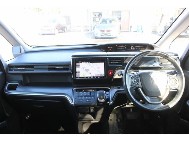 ステップワゴンスパーダ スパーダハイブリッド　Ｇ・ＥＸ　ホンダセンシング　禁煙車　純正後席モニター　純正９型ナビ　フルセグ　バックカメラ　アダクティブクルーズコントロール　衝突軽減ブレーキ　両側電動スライドドア　純正１６インチアルミホイール　誤発進抑制機能　ビルドインＥＴＣ（54枚目）