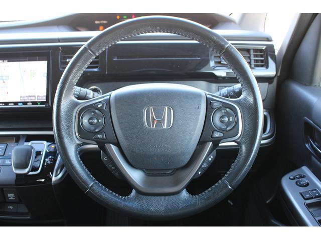 ステップワゴンスパーダ スパーダハイブリッド　Ｇ・ＥＸ　ホンダセンシング　禁煙車　純正後席モニター　純正９型ナビ　フルセグ　バックカメラ　アダクティブクルーズコントロール　衝突軽減ブレーキ　両側電動スライドドア　純正１６インチアルミホイール　誤発進抑制機能　ビルドインＥＴＣ（55枚目）