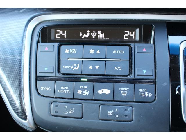 ステップワゴンスパーダ スパーダハイブリッド　Ｇ・ＥＸ　ホンダセンシング　禁煙車　純正後席モニター　純正９型ナビ　フルセグ　バックカメラ　アダクティブクルーズコントロール　衝突軽減ブレーキ　両側電動スライドドア　純正１６インチアルミホイール　誤発進抑制機能　ビルドインＥＴＣ（71枚目）