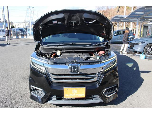 ステップワゴンスパーダ スパーダハイブリッド　Ｇ・ＥＸ　ホンダセンシング　禁煙車　純正後席モニター　純正９型ナビ　フルセグ　バックカメラ　アダクティブクルーズコントロール　衝突軽減ブレーキ　両側電動スライドドア　純正１６インチアルミホイール　誤発進抑制機能　ビルドインＥＴＣ（77枚目）