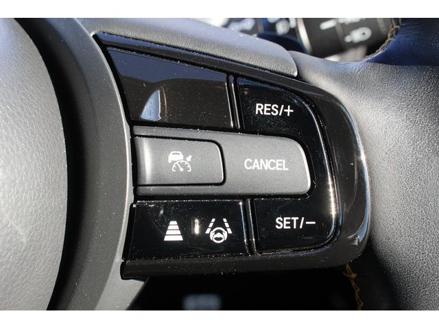 フィット ｅ：ＨＥＶ　ＲＳ　禁煙車　純正８インチナビ　フルセグ　バックカメラ　衝突軽減ブレーキ　運転支援システム　アダプティブクルーズコントロール　白線逸脱警報　パーキングアラート　ホールド機能付ブレーキ　ビルドインＥＴＣ２．０（6枚目）