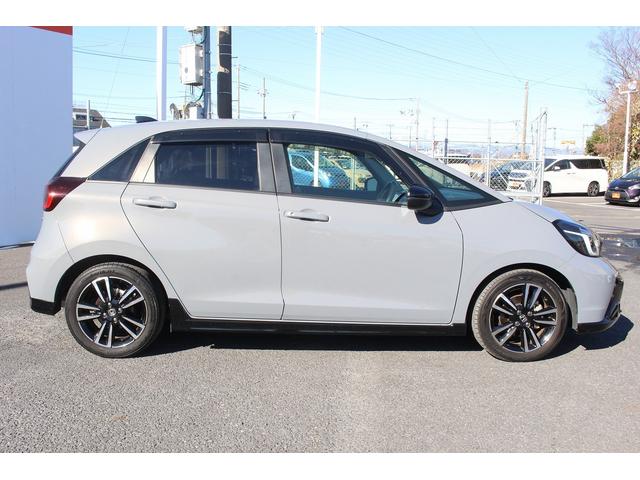 フィット ｅ：ＨＥＶ　ＲＳ　禁煙車　純正８インチナビ　フルセグ　バックカメラ　衝突軽減ブレーキ　運転支援システム　アダプティブクルーズコントロール　白線逸脱警報　パーキングアラート　ホールド機能付ブレーキ　ビルドインＥＴＣ２．０（9枚目）