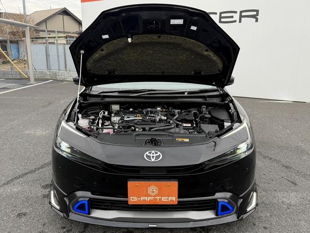 プリウス Ｚ　禁煙車　パノラマルーフ　デジタルインナーミラー　モデリスタエアロ　黒革シート　ＡＣ１００Ｖ電源　純正１２．３型ディスプレイオーディオ　地デジ　パノラミックビューカメラ　衝突軽減　レーダークルーズ（76枚目）