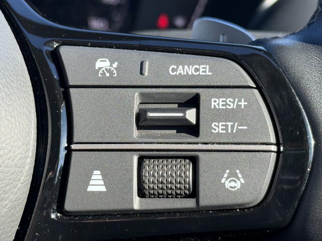 ＺＲ－Ｖ ｅ：ＨＥＶ　Ｚ　禁煙車　ヒーター付きパワーシート　純正９インチナビ　フルセグ　全方位カメラ　運転支援システム　衝突軽減ブレーキ　ステアリングヒーター　パワーバックドア　後退時アラート　パドルシフト　ワイヤレス充電器（5枚目）