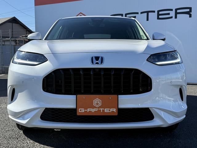 ＺＲ－Ｖ ｅ：ＨＥＶ　Ｚ　禁煙車　ヒーター付きパワーシート　純正９インチナビ　フルセグ　全方位カメラ　運転支援システム　衝突軽減ブレーキ　ステアリングヒーター　パワーバックドア　後退時アラート　パドルシフト　ワイヤレス充電器（8枚目）