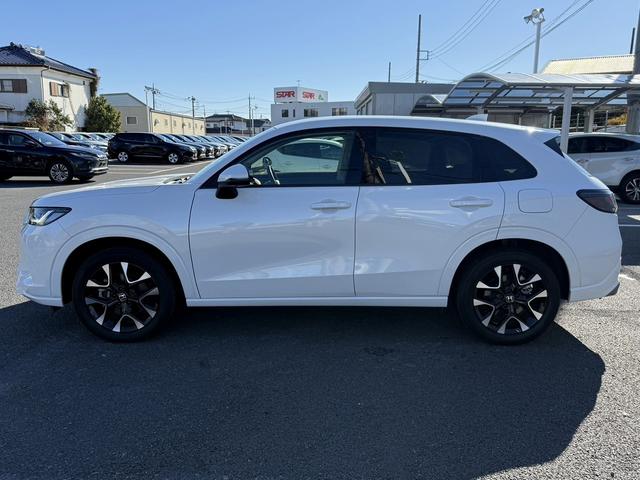 ＺＲ－Ｖ ｅ：ＨＥＶ　Ｚ　禁煙車　ヒーター付きパワーシート　純正９インチナビ　フルセグ　全方位カメラ　運転支援システム　衝突軽減ブレーキ　ステアリングヒーター　パワーバックドア　後退時アラート　パドルシフト　ワイヤレス充電器（11枚目）