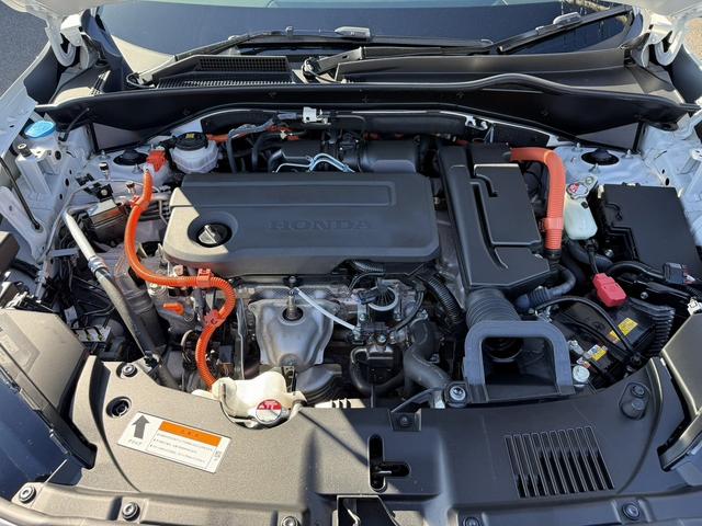 ＺＲ－Ｖ ｅ：ＨＥＶ　Ｚ　禁煙車　ヒーター付きパワーシート　純正９インチナビ　フルセグ　全方位カメラ　運転支援システム　衝突軽減ブレーキ　ステアリングヒーター　パワーバックドア　後退時アラート　パドルシフト　ワイヤレス充電器（20枚目）