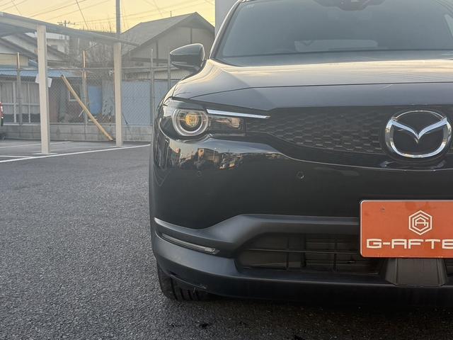 ＭＸ－３０ロータリーＥＶ エディションＲ　禁煙車　純正１０．２５インチディスプレイ　ＢＯＳＥサウンド　フルセグ　アラウンドビューカメラ　ステアリングヒーター　ハーフレザー　メモリ機能付パワーシート　ＥＴＣ　シートヒーター　衝突軽減ブレーキ（18枚目）