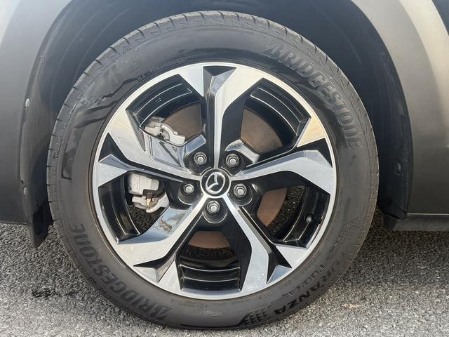 ＭＸ－３０ロータリーＥＶ エディションＲ　禁煙車　純正１０．２５インチディスプレイ　ＢＯＳＥサウンド　フルセグ　アラウンドビューカメラ　ステアリングヒーター　ハーフレザー　メモリ機能付パワーシート　ＥＴＣ　シートヒーター　衝突軽減ブレーキ（25枚目）