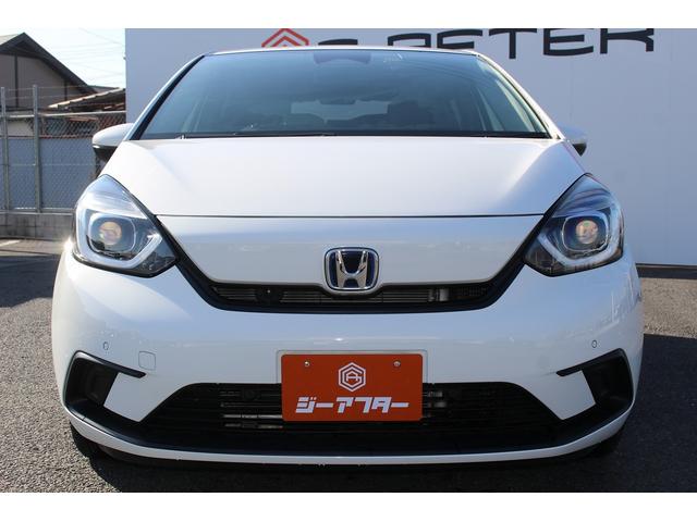フィット ｅ：ＨＥＶベーシック　禁煙車　ホンダセンシング　社外ナビ　衝突軽減ブレーキ　運転支援システム　ホールドブレーキ　ビルドインＥＴＣ　車線逸脱警報　アダプティブクルーズコントロール　Ｂｌｕｅｔｏｏｔｈ接続　コーナーセンサー（8枚目）