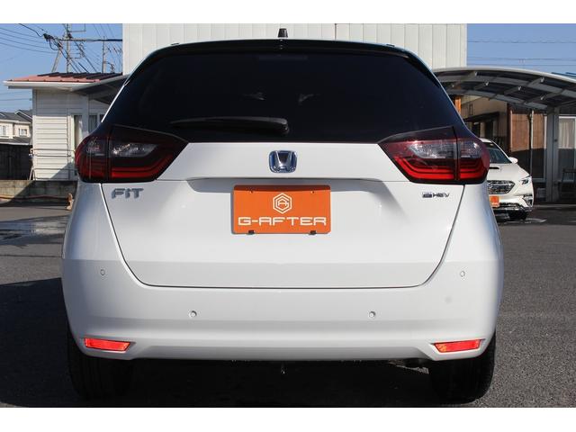 フィット ｅ：ＨＥＶベーシック　禁煙車　ホンダセンシング　社外ナビ　衝突軽減ブレーキ　運転支援システム　ホールドブレーキ　ビルドインＥＴＣ　車線逸脱警報　アダプティブクルーズコントロール　Ｂｌｕｅｔｏｏｔｈ接続　コーナーセンサー（10枚目）