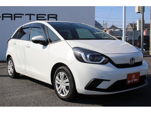 フィット ｅ：ＨＥＶベーシック　禁煙車　ホンダセンシング　社外ナビ　衝突軽減ブレーキ　運転支援システム　ホールドブレーキ　ビルドインＥＴＣ　車線逸脱警報　アダプティブクルーズコントロール　Ｂｌｕｅｔｏｏｔｈ接続　コーナーセンサー（21枚目）