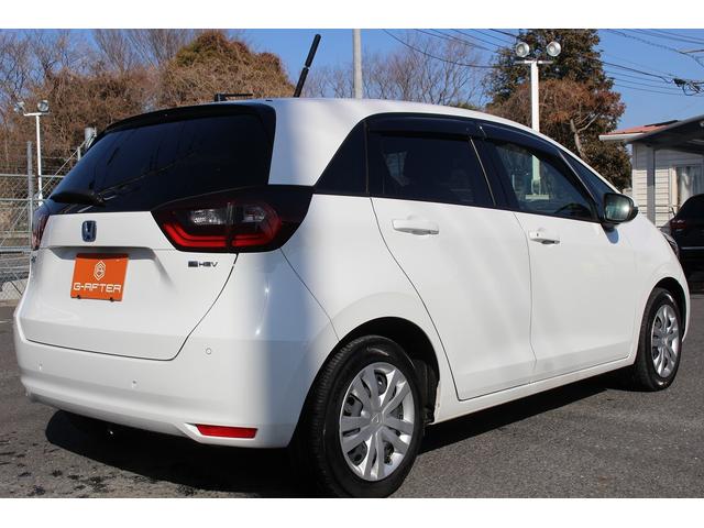 フィット ｅ：ＨＥＶベーシック　禁煙車　ホンダセンシング　社外ナビ　衝突軽減ブレーキ　運転支援システム　ホールドブレーキ　ビルドインＥＴＣ　車線逸脱警報　アダプティブクルーズコントロール　Ｂｌｕｅｔｏｏｔｈ接続　コーナーセンサー（22枚目）