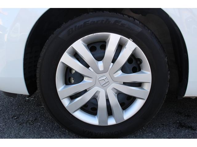 フィット ｅ：ＨＥＶベーシック　禁煙車　ホンダセンシング　社外ナビ　衝突軽減ブレーキ　運転支援システム　ホールドブレーキ　ビルドインＥＴＣ　車線逸脱警報　アダプティブクルーズコントロール　Ｂｌｕｅｔｏｏｔｈ接続　コーナーセンサー（33枚目）