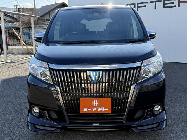 エスクァイア ハイブリッドGi ブラックテーラード 禁煙車 TRDフルエアロ 純正11インチ後席モニター 純正10インチナビ 両側電動スライドドア トヨタセーフティセンスC フルセグ バックカメラ 衝突軽減ブレーキ Bluetooth ビルドインETC(7枚目)