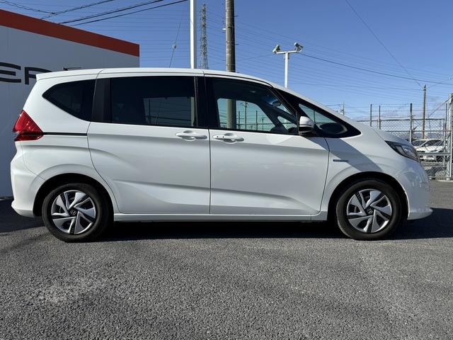 フリードハイブリッド ハイブリッド・Gホンダセンシング 禁煙車 ワンオーナー 純正ナビ フルセグ バックカメラ 衝突軽減ブレーキ 両側電動スライドドア 運転支援システム アダプティブクルーズコントロール レーンキープ ビルドインETC Bluetooth(9枚目)