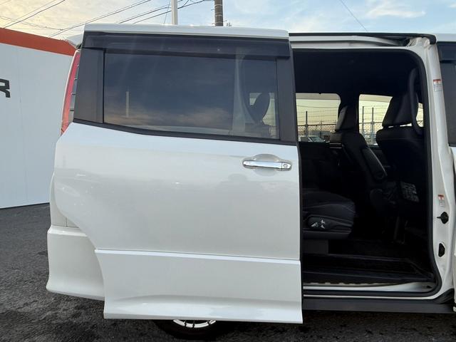 ノア ハイブリッドＳｉ　ダブルバイビー　禁煙車　純正９インチナビ　衝突軽減ブレーキ　両側電動スライドドア　フルセグ　バックカメラ　クルーズコントロール　ハーフレザー　シートヒーター　レーンキープ　ビューモニター．０　オートハイビーム（32枚目）