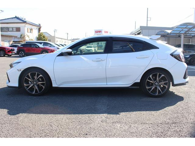 シビック ハッチバック　ホンダセンシング　６ＭＴ　社外ナビ　フルセグ　衝突軽減ブレーキ　レーダークルーズコントロール　シートヒーター　ホンダセンシング　ＬＥＤヘッドライト　フォグライト　ＥＴＣ　純正アルミホイール　スマートキー　電動格納ミラー（11枚目）