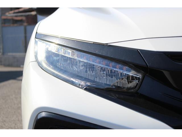 シビック ハッチバック　ホンダセンシング　６ＭＴ　社外ナビ　フルセグ　衝突軽減ブレーキ　レーダークルーズコントロール　シートヒーター　ホンダセンシング　ＬＥＤヘッドライト　フォグライト　ＥＴＣ　純正アルミホイール　スマートキー　電動格納ミラー（12枚目）