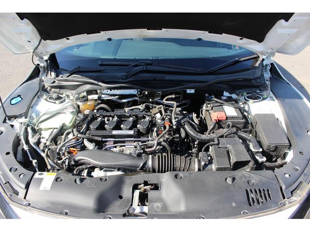 シビック ハッチバック　ホンダセンシング　６ＭＴ　社外ナビ　フルセグ　衝突軽減ブレーキ　レーダークルーズコントロール　シートヒーター　ホンダセンシング　ＬＥＤヘッドライト　フォグライト　ＥＴＣ　純正アルミホイール　スマートキー　電動格納ミラー（20枚目）