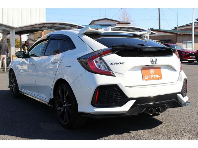 シビック ハッチバック　ホンダセンシング　６ＭＴ　社外ナビ　フルセグ　衝突軽減ブレーキ　レーダークルーズコントロール　シートヒーター　ホンダセンシング　ＬＥＤヘッドライト　フォグライト　ＥＴＣ　純正アルミホイール　スマートキー　電動格納ミラー（23枚目）