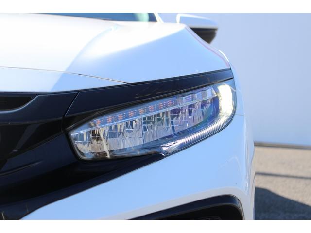 シビック ハッチバック　ホンダセンシング　６ＭＴ　社外ナビ　フルセグ　衝突軽減ブレーキ　レーダークルーズコントロール　シートヒーター　ホンダセンシング　ＬＥＤヘッドライト　フォグライト　ＥＴＣ　純正アルミホイール　スマートキー　電動格納ミラー（26枚目）