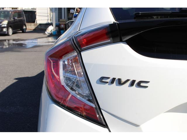 シビック ハッチバック　ホンダセンシング　６ＭＴ　社外ナビ　フルセグ　衝突軽減ブレーキ　レーダークルーズコントロール　シートヒーター　ホンダセンシング　ＬＥＤヘッドライト　フォグライト　ＥＴＣ　純正アルミホイール　スマートキー　電動格納ミラー（28枚目）