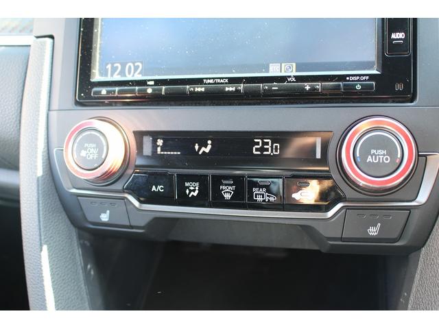 シビック ハッチバック　ホンダセンシング　６ＭＴ　社外ナビ　フルセグ　衝突軽減ブレーキ　レーダークルーズコントロール　シートヒーター　ホンダセンシング　ＬＥＤヘッドライト　フォグライト　ＥＴＣ　純正アルミホイール　スマートキー　電動格納ミラー（60枚目）