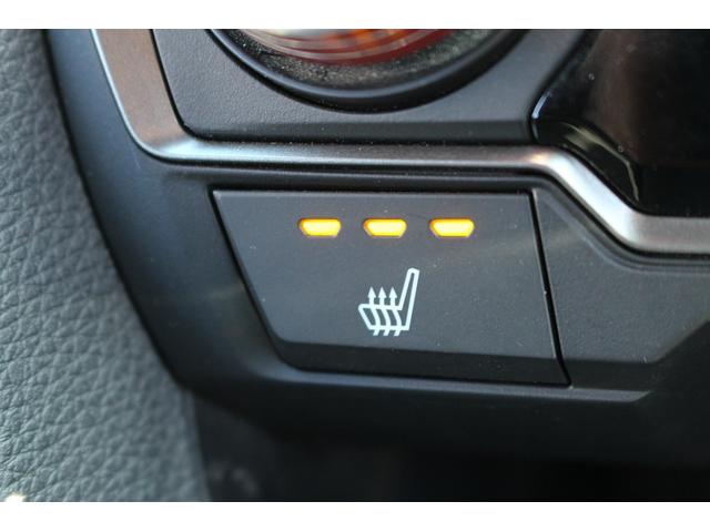 シビック ハッチバック　ホンダセンシング　６ＭＴ　社外ナビ　フルセグ　衝突軽減ブレーキ　レーダークルーズコントロール　シートヒーター　ホンダセンシング　ＬＥＤヘッドライト　フォグライト　ＥＴＣ　純正アルミホイール　スマートキー　電動格納ミラー（61枚目）