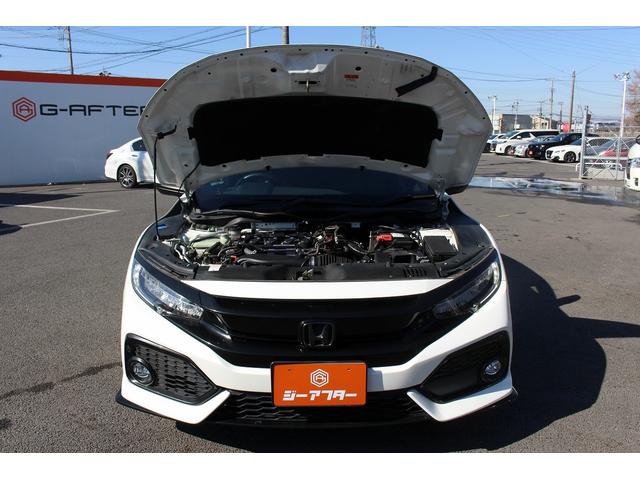 シビック ハッチバック　ホンダセンシング　６ＭＴ　社外ナビ　フルセグ　衝突軽減ブレーキ　レーダークルーズコントロール　シートヒーター　ホンダセンシング　ＬＥＤヘッドライト　フォグライト　ＥＴＣ　純正アルミホイール　スマートキー　電動格納ミラー（75枚目）