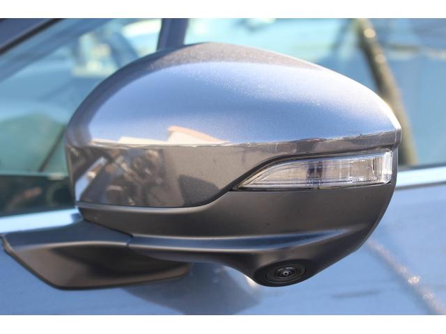 レヴォーグ ＳＴＩスポーツ　ＥＸ　禁煙車　サンルーフ　スマートリアビューミラー　本革シート　アイサイトＸ　純正１１．６インチナビ　フルセグ　フロントサイドバックカメラ　衝突軽減　クリアランスソアー　電動リアゲート　パワーシート　ＥＴＣ（22枚目）
