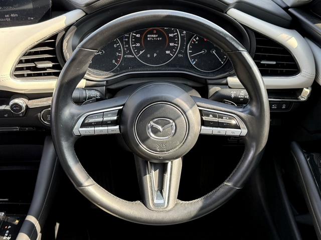 ＭＡＺＤＡ３セダン Ｘ　Ｌパッケージ　禁煙車　白革シート　純正１０．２５インチディスプレイ　３６０度セーフティパッケージ　フルセグ　シート・ステアリングヒーター　メモリ付パワーシート　アダプティブクルーズコントロール　クリアランスソナー（43枚目）