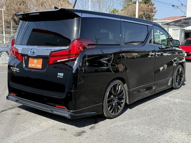 アルファードハイブリッド エグゼクティブラウンジ　禁煙車　純正１０インチナビ　フルセグ　バック＆サイドカメラ　１２型リアエンターモニター　ＪＢＬサウンド　ＴＲＤフルエアロ　ＲＡＹＳ２０インチＡＷ　衝突軽減　運転支援　ＡＣ１００Ｖ　ステアリングヒート（23枚目）