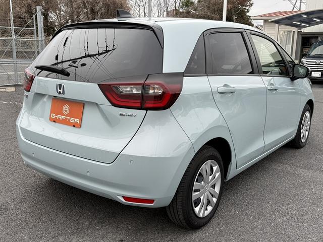 フィット ｅ：ＨＥＶホーム　禁煙車　ホンダセンシング　純正９インチナビ　バックカメラ　フルセグ　衝突軽減ブレーキシステム　運転支援システム　純正ビルトインＥＴＣ　レーダークルーズ　逸脱警報　コーナーセンサー　ステアリングリモコン（22枚目）