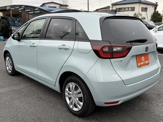フィット ｅ：ＨＥＶホーム　禁煙車　ホンダセンシング　純正９インチナビ　バックカメラ　フルセグ　衝突軽減ブレーキシステム　運転支援システム　純正ビルトインＥＴＣ　レーダークルーズ　逸脱警報　コーナーセンサー　ステアリングリモコン（23枚目）