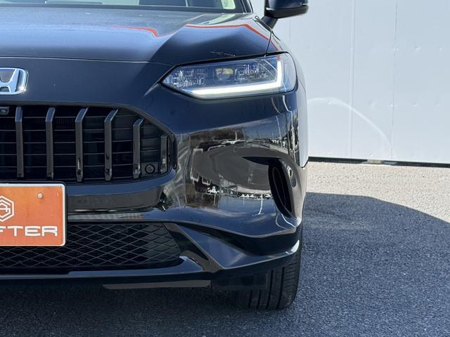 ZR-V e:HEV Z 禁煙車 温熱機能付黒革シート BOSEサウンド 純正9インチナビ ホンダセンシング アラウンドビューモニター フルセグ 電動リアゲート ETC2.0 シートメモリー ステアリングヒーター(25枚目)