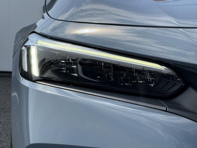 シビック ＬＸ　ワンオーナー　禁煙車　ＳＳＲ１８インチアルミ　柿本マフラー　ＢＬＩＴＺ車高調　ホンダセンシング　純正９インチディスプレイナビ　バックカメラ　フルセグ　シートヒーター　レーダークルーズ　ＥＴＣ２．０（12枚目）