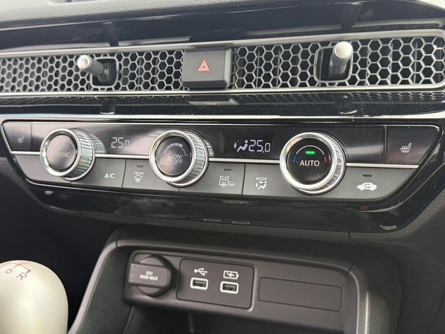 シビック ＬＸ　ワンオーナー　禁煙車　ＳＳＲ１８インチアルミ　柿本マフラー　ＢＬＩＴＺ車高調　ホンダセンシング　純正９インチディスプレイナビ　バックカメラ　フルセグ　シートヒーター　レーダークルーズ　ＥＴＣ２．０（59枚目）