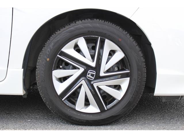 シャトル ハイブリッドＸ　ホンダセンシング　禁煙車　純正ナビ　ホンダセンシング　バックカメラ　ハーフレザーシート　シートヒーター　ビルトインＥＴＣ　レーダークルーズ　アクセサリーソケット　シルバーパドルシフト　オーディオステアリングスイッチ（14枚目）