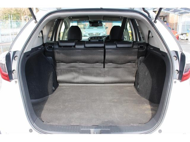 シャトル ハイブリッドＸ　ホンダセンシング　禁煙車　純正ナビ　ホンダセンシング　バックカメラ　ハーフレザーシート　シートヒーター　ビルトインＥＴＣ　レーダークルーズ　アクセサリーソケット　シルバーパドルシフト　オーディオステアリングスイッチ（19枚目）