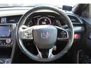 ハッチバック　ホンダセンシング　６ＭＴ　社外ナビ　フルセグ　衝突軽減ブレーキ　レーダークルーズコントロール　シートヒーター　ホンダセンシング　ＬＥＤヘッドライト　フォグライト　ＥＴＣ　純正アルミホイール　スマートキー　電動格納ミラー（18枚目）