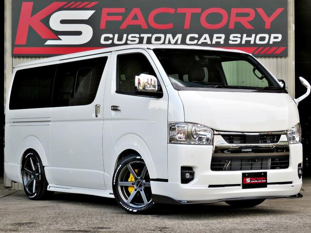 ハイエースバン スーパーGL ダークプライムII 新車未登録/7型/6AT/2800ccディーゼルターボ/415コブラフルエアロ/18インチAW/両側出しマフラーカッター/ワイパーカウル/ルーフスポイラー/イエローキャリパーカバー/フルセグTV/(21枚目)