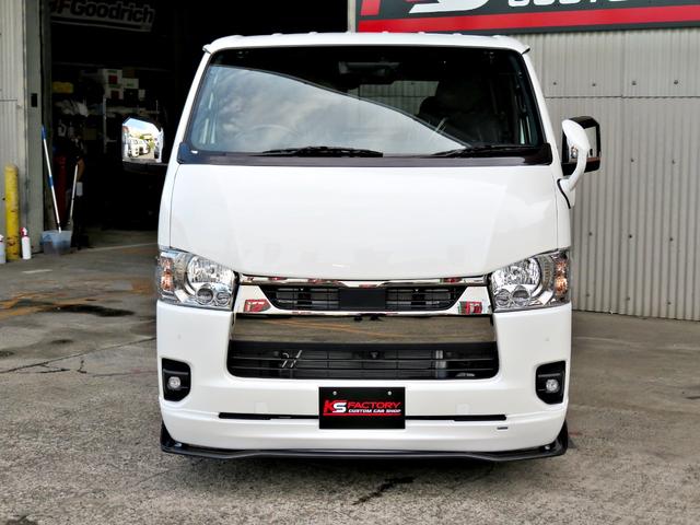 ハイエースバン スーパーGL ダークプライムII 新車未登録/7型/6AT/2800ccディーゼルターボ/415コブラフルエアロ/18インチAW/両側出しマフラーカッター/ワイパーカウル/ルーフスポイラー/イエローキャリパーカバー/フルセグTV/(24枚目)