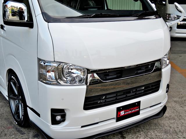 ハイエースバン スーパーGL ダークプライムII 新車未登録/7型/6AT/2800ccディーゼルターボ/415コブラフルエアロ/18インチAW/両側出しマフラーカッター/ワイパーカウル/ルーフスポイラー/イエローキャリパーカバー/フルセグTV/(25枚目)