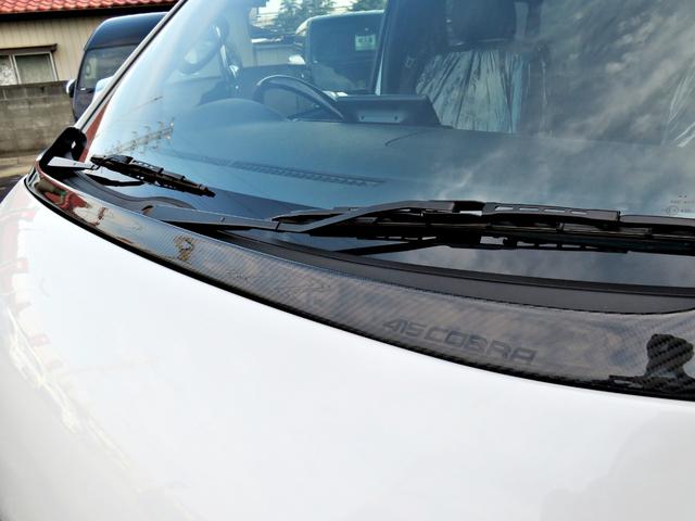 ハイエースバン スーパーGL ダークプライムII 新車未登録/7型/6AT/2800ccディーゼルターボ/415コブラフルエアロ/18インチAW/両側出しマフラーカッター/ワイパーカウル/ルーフスポイラー/イエローキャリパーカバー/フルセグTV/(26枚目)