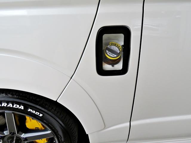 ハイエースバン スーパーGL ダークプライムII 新車未登録/7型/6AT/2800ccディーゼルターボ/415コブラフルエアロ/18インチAW/両側出しマフラーカッター/ワイパーカウル/ルーフスポイラー/イエローキャリパーカバー/フルセグTV/(30枚目)