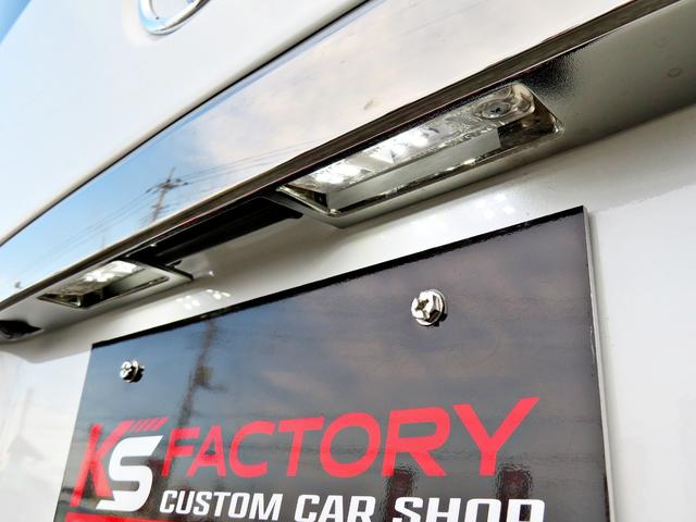 ハイエースバン スーパーGL ダークプライムII 新車未登録/7型/6AT/2800ccディーゼルターボ/415コブラフルエアロ/18インチAW/両側出しマフラーカッター/ワイパーカウル/ルーフスポイラー/イエローキャリパーカバー/フルセグTV/(52枚目)