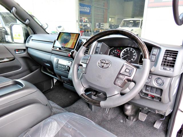 ハイエースバン スーパーGL ダークプライムII 新車未登録/7型/6AT/2800ccディーゼルターボ/415コブラフルエアロ/18インチAW/両側出しマフラーカッター/ワイパーカウル/ルーフスポイラー/イエローキャリパーカバー/フルセグTV/(55枚目)